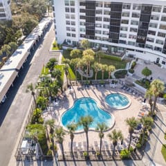 Updated 2-Bed Condo Steps from Beach