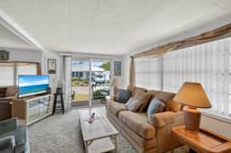 Charming Coastal Trailer Home with Private Parking
