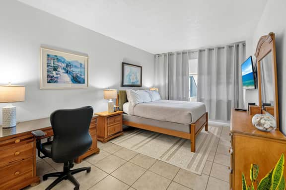 Updated 2-Bed Condo Steps from Beach